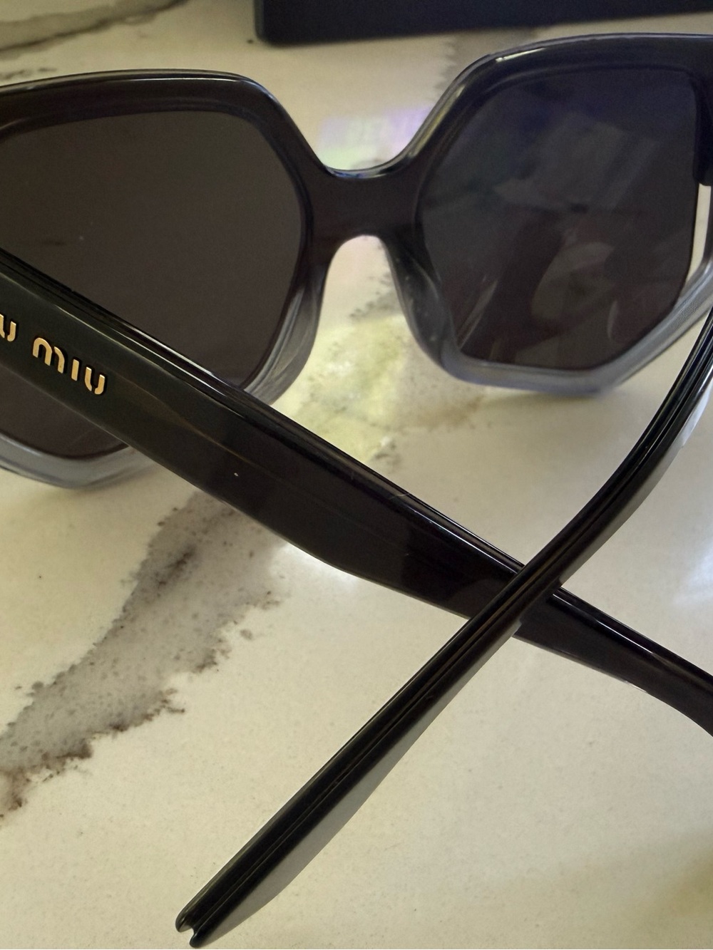 Miu Miu Black Women's Sunglasses with Gold Logo Accent
